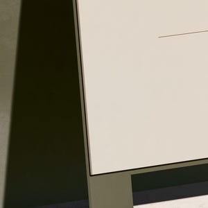 A tall cream wedding-sign mockup displayed upright with coordinated cream and olive paper stationery on a neutral surface. Soft daylight highlights the simple rectangular layout and paper textures.
