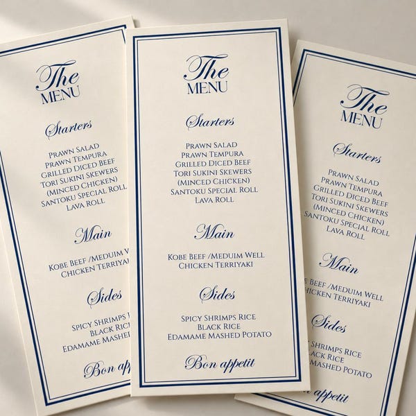 Dinner menu cards with a navy border