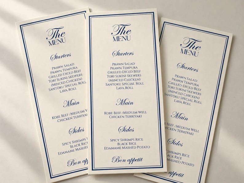 Dinner menu cards with a navy border