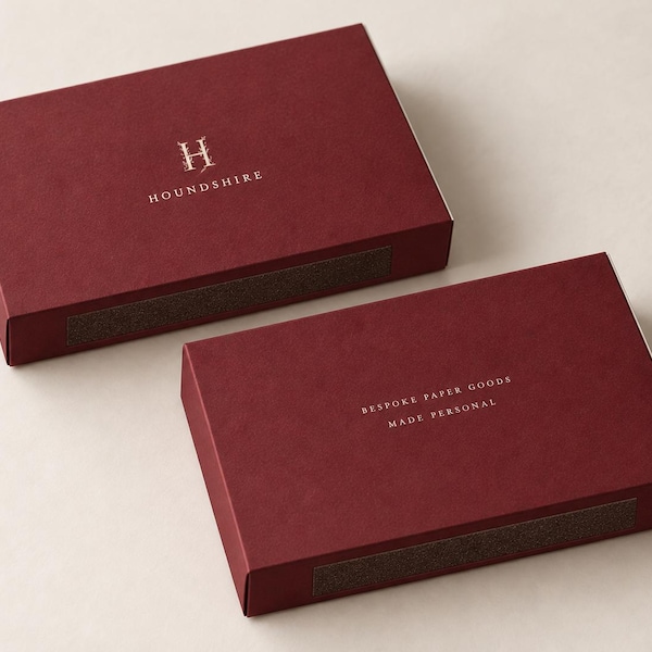 Burgundy oversized matchbox with a printed monogram