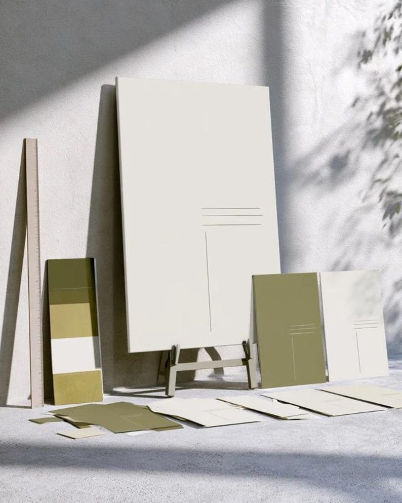 A tall cream wedding-sign mockup displayed upright with coordinated cream and olive paper stationery on a neutral surface. Soft daylight highlights the simple rectangular layout and paper textures.