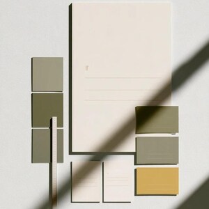 A tall cream wedding-sign mockup displayed upright with coordinated cream and olive paper stationery on a neutral surface. Soft daylight highlights the simple rectangular layout and paper textures.
