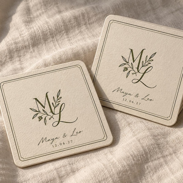 Square cream coasters with a green ML monogram