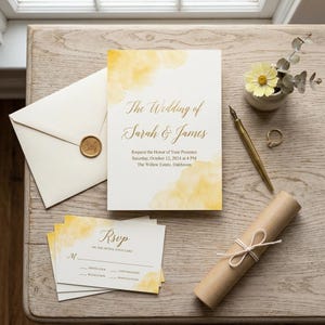 May include: A wedding invitation suite featuring a white card with yellow watercolour accents and gold script text reading The Wedding of Sarah & James, an RSVP card, a cream envelope with a gold wax seal, a gold fountain pen, and a rolled paper scroll.