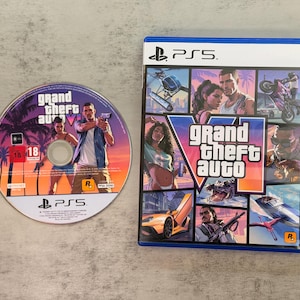 May include: A PlayStation 5 video game case and disc for Grand Theft Auto VI. The blue case features a collage of game characters, vehicles, and a sunset background. The disc displays the game title, a character holding a firearm, and an 18 rating.