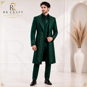May include: A dark green long coat, waistcoat, and trousers set featuring intricate tonal embroidery along the lapels and cuffs. The ensemble includes a matching dark green tie and black dress shoes. The RK CRAFT logo is visible in the top left corner.
