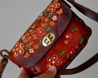 danier leather crossbody bolsa