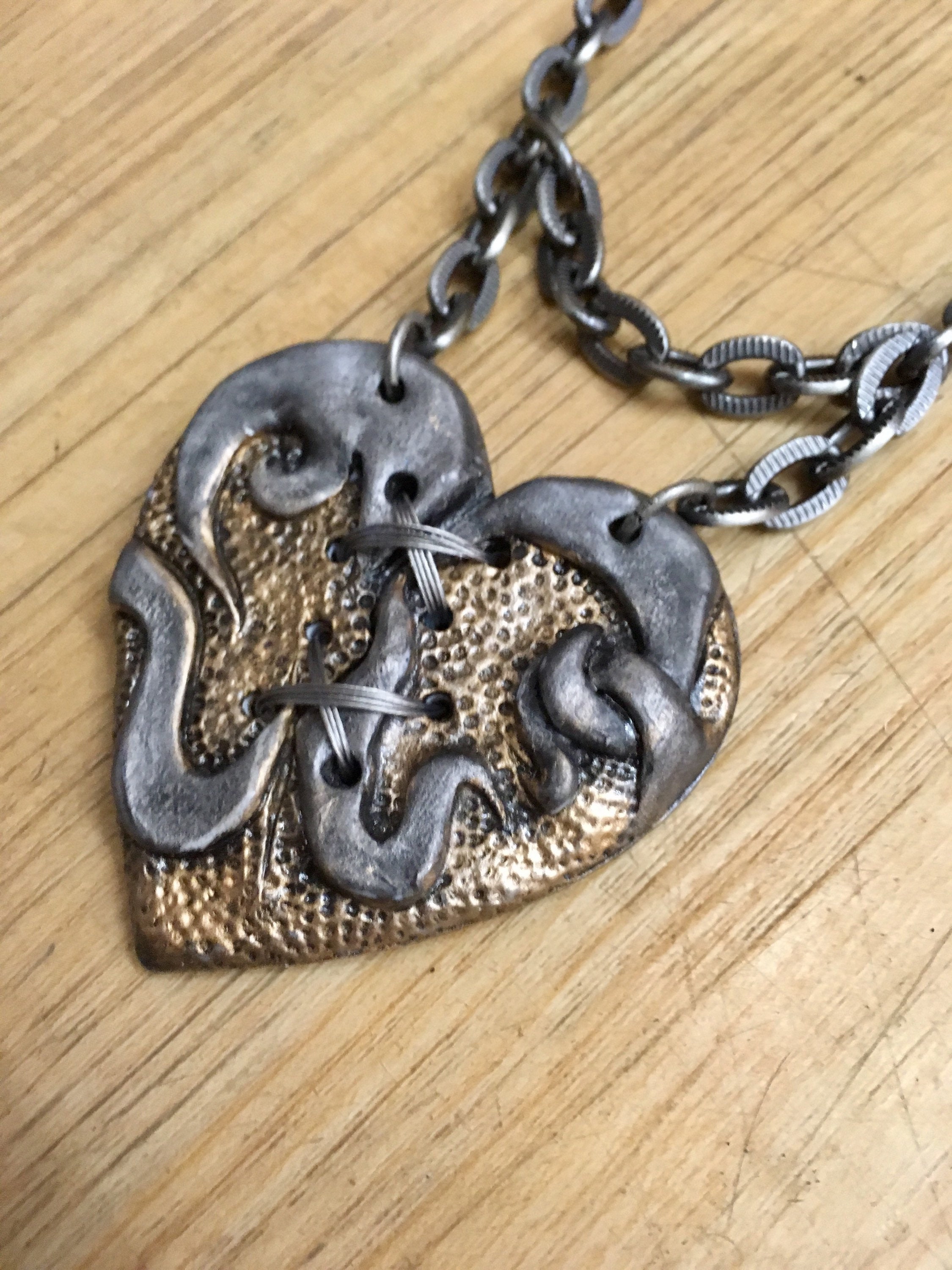 Mended heart necklace deals