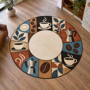 May include: A round area rug featuring a central cream circle surrounded by rectangular panels displaying coffee-themed illustrations, including steaming cups, moka pots, coffee beans, and botanical leaves in shades of blue, brown, and black.