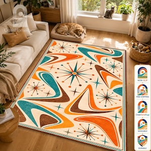May include: A rectangular area rug featuring a cream-colored background with a repeating pattern of large orange and teal boomerang shapes interspersed with dark brown and teal starburst designs across the entire surface of the floor covering.