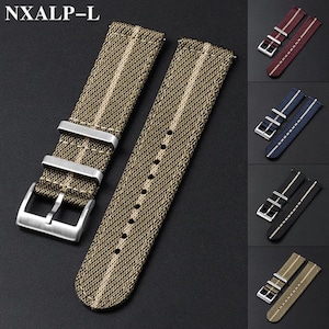 May include: A set of woven watch straps featuring the text NXALP-L, available in olive green, burgundy, navy blue, black, and khaki. Each strap includes a silver-toned metal buckle and two matching metal keepers, with a central vertical stripe.