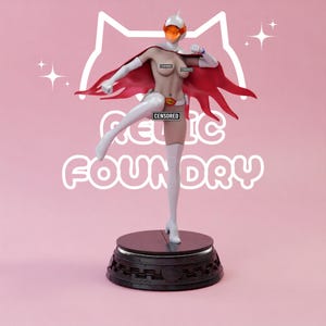 May include: A standing figurine of a character wearing a white helmet with an orange visor, a red cape, white gloves, and white thigh-high boots. The figure features a belt with a yellow and red emblem and stands on a dark circular base.