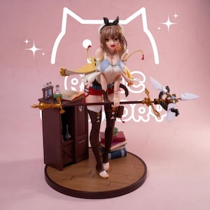 May include: A detailed anime-style figurine of a character with brown hair wearing a white top, red shorts, and brown thigh-high stockings. The figure holds a long staff with white blades and stands next to a brown cabinet with bottles and books.