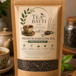 May include: A brown kraft paper pouch of Tea Batti Co. Premium Darjeeling Tea with a clear window showing loose tea leaves. The label features a tea cup, incense, and text including 'Net Wt. 200g' and 'Handmade in Small Batches'.