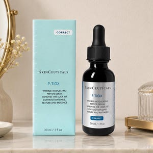 May include: A light blue rectangular box and a dark amber glass dropper bottle of SkinCeuticals P-TIOX wrinkle-modulating peptide serum. Both items feature white labels with black text stating the product name, benefits, and a volume of 30 ml / 1 fl oz.