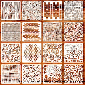 May include: A set of sixteen square white stencils featuring various patterns including wood grain, brickwork, geometric grids, organic swirls, circular dots, and abstract textures, each with a small circular hole in the top left corner for hanging.