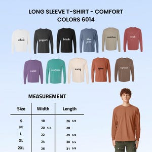 May include: A collection of long sleeve t-shirts in colors white, pepper, black, blue jean, sandstone, brick, violet, seafoam, ivory, yam, and espresso. A size chart displays widths and lengths in inches for sizes S to 2XL. A person wears a yam long sleeve t-shirt.