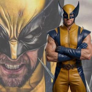 May include: A character costume featuring a yellow and navy blue leather-like jumpsuit with a matching mask that has pointed ears. The outfit includes long navy blue gloves and a brown belt with a circular buckle, worn with arms crossed.