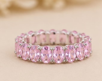 Eternity ring met roze saffier • Ring met in het laboratorium gekweekte roze saffier • Ring met roze edelsteen • Ovaal geslepen ring • Sieraden met roze edelstenen • Trouwring