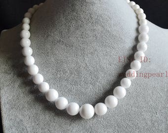 round diamond with cushion halo