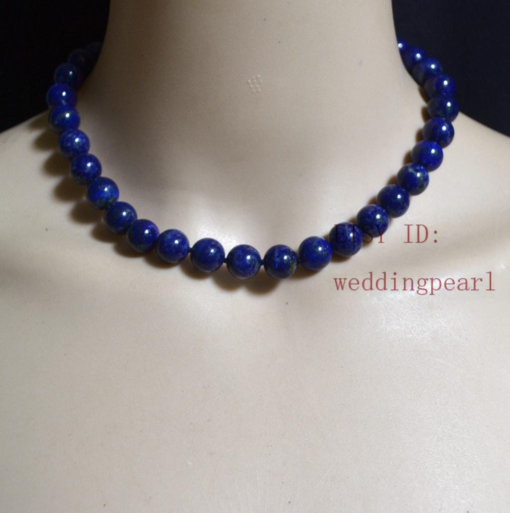 La Collana Fatta A Mano Fatta Delle Perle Variopinte Luminose Merino Naturali Asciutte Della Lana Feltro Ha Asciugato Le Palle 97767414 - Foto 11