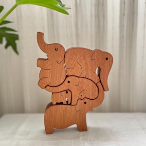 Wooden Elephants tower, Balancing game, Mahogany pyramid.