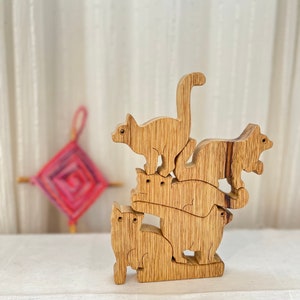 Wooden cats pyramid for cat lovers.