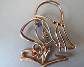 1988 JJ Jonette openwork lady silhouette pin Fashion lady hat face pin