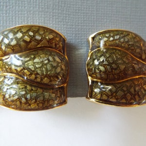 gold plated faux snake skin domed clip earrings marked SJ