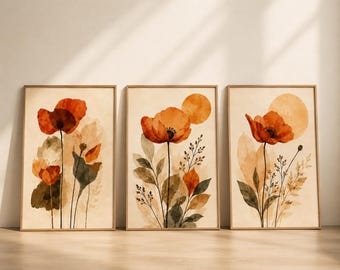 May include: A set of three framed wall art prints featuring watercolor illustrations of orange poppies and botanical foliage against a cream background. Each rectangular print displays a different floral arrangement with warm earth tones.