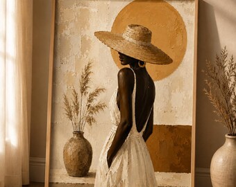 May include: A framed wall art print featuring a person in a wide-brimmed straw hat and a white dress, standing beside a vase with dried grasses. The background displays a large ochre circle against a textured cream and brown wall surface.