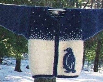 May include: Two knitted sweaters with contrasting colours and designs. The sweater on the left is blue with white accents and a penguin design. The sweater on the right is pink with white accents and a reindeer design.