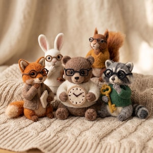May include: A collection of five needle-felted animal figurines including a fox, a white rabbit, a brown bear, a squirrel, and a raccoon. Each animal wears small round glasses. The bear holds a clock, the fox holds a book, and the raccoon holds a key.