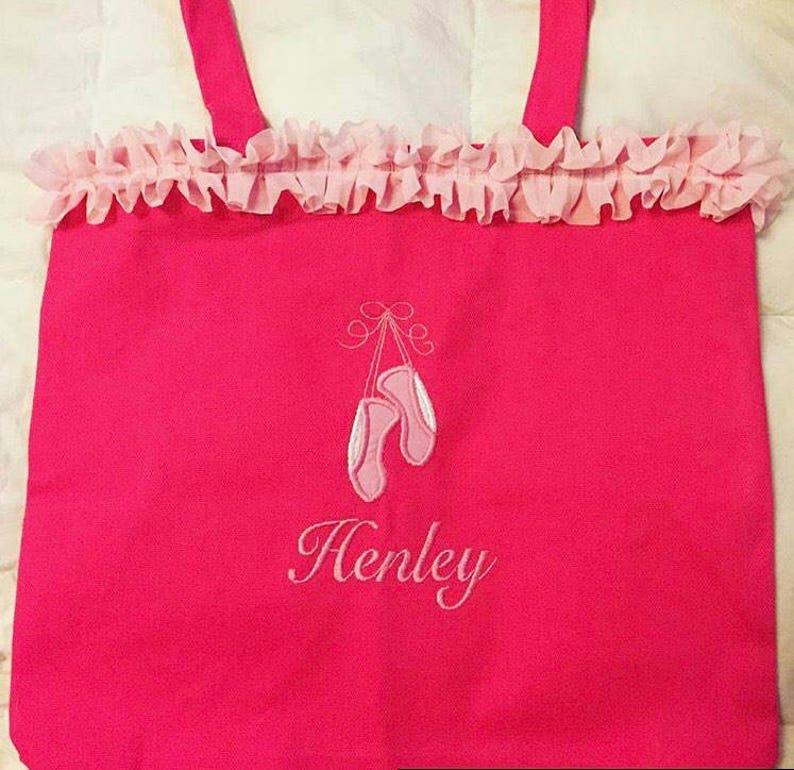 Pink ballet bag with embroidered applique of ballet slippers and name embroidered below slippers