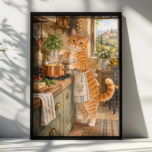 May include: A framed wall art print depicting an orange tabby cat wearing a blue and white striped apron, standing in a rustic kitchen. The cat is stirring a copper pot on a stove, with kitchen ingredients and a window view of a landscape.