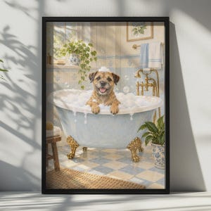 May include: A framed wall art print depicting a brown terrier dog sitting in a light blue clawfoot bathtub filled with white soap bubbles. The bathroom features blue and white checkered floor tiles, brass fixtures, and potted green plants.