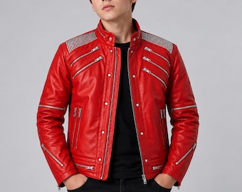 May include: A vibrant red leather jacket featuring a stand-up collar, silver-toned metal zippers on the chest and sleeves, and ribbed shoulder panels. The jacket is worn over a plain black t-shirt and paired with black denim jeans.