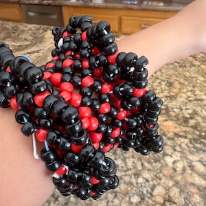 Svart och röd Kandi rotermanschett