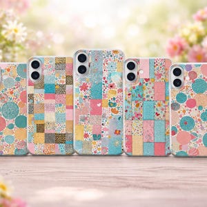 May include: Five smartphone cases arranged in a row, each featuring a distinct pattern of colorful circles, squares, and floral motifs in shades of pink, blue, yellow, and orange, with dual camera cutouts visible on the upper left corner of each case.