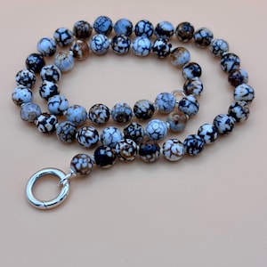 Halsband med brunt eldagat