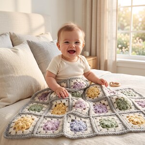 May include: A handmade crochet baby blanket featuring a grid of square motifs in soft pastel shades of yellow, lavender, and sage green, each bordered by white and light gray yarn, creating a textured, multi-colored floral pattern throughout.
