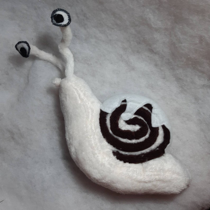 Cinnasnail A Bugsnax Plushie a Cinnamon Roll Snail. Etsy Australia