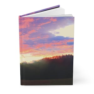 Cuaderno de tapa dura con diseño de horizonte al atardecer en el norte del estado, paisaje del amanecer, diario de viajes y reflexiones