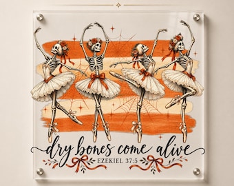 May include: A DTF transfer design featuring four skeletons in white tutus and floral headpieces dancing against an orange brushstroke background with spiderwebs and stars. The text reads dry bones come alive and EZEKIEL 37:5 with red ribbons.