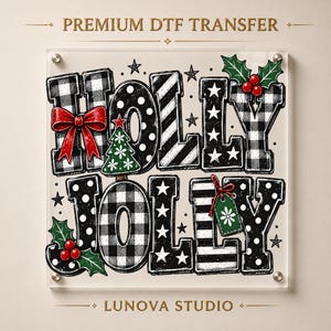 May include: A square graphic print labeled PREMIUM DTF TRANSFER and LUNOVA STUDIO featuring the text HOLLY JOLLY in black and white patterns including buffalo plaid, polka dots, stripes, and stars, accented with red bows, holly, and a tree.