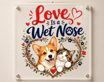 Puede incluir: Una transferencia DTF cuadrada con un Corgi y un gato calicó enmarcados por un corazón floral. El texto dice Love Is a Wet Nose. El diseño incluye corazones rojos, huellas azules y flores coloridas sobre una placa de acrílico transparente.
