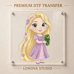 May include: A square acrylic display featuring a cartoon illustration of a blonde character with long hair adorned with small purple and pink flowers, wearing a purple dress, and holding a green chameleon. Text reads PREMIUM DTF TRANSFER LUNOVA STUDIO.
