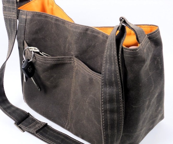 Handmade crossbody bags, totes, and wallets made from waxed canvas