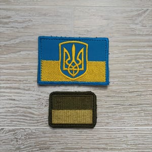 Bandera ucraniana, parche bordado verde oliva. Bandera ucraniana con un tridente en sus auténticos colores amarillo y azul.