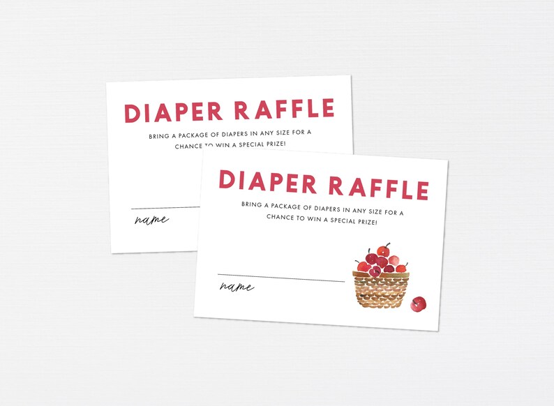 Op de afbeelding: Twee witte kaarten met rode tekst die "Diaper Raffle" zegt. De kaarten hebben een regel voor een naam en instructies om een ​​pakket luiers mee te nemen voor een kans om een ​​speciale prijs te winnen. Een kaart heeft een aquarel-illustratie van een mand met rode kersen.